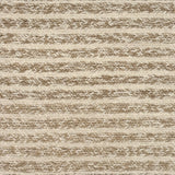Close up of a handwoven rug in textural sumak weave with cream and taupe stripes.