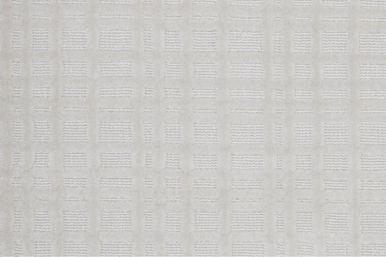 Broadloom carpet in a dimensional check lattice in ivory.