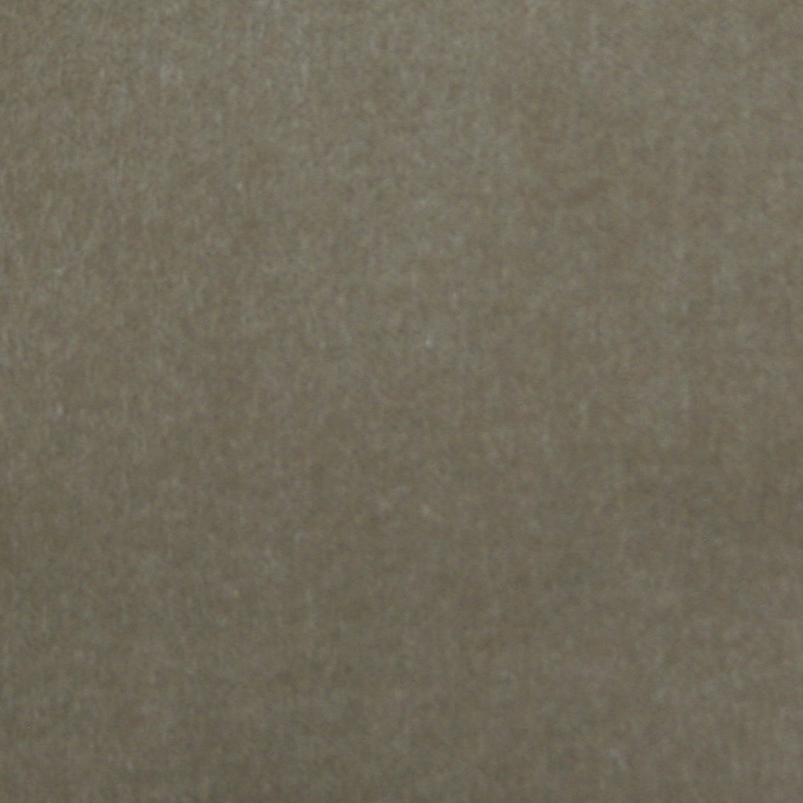 Detail of velvet fabric yardage in gray.