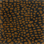 Handknotted rug with abstract animal motif in grey and tan.