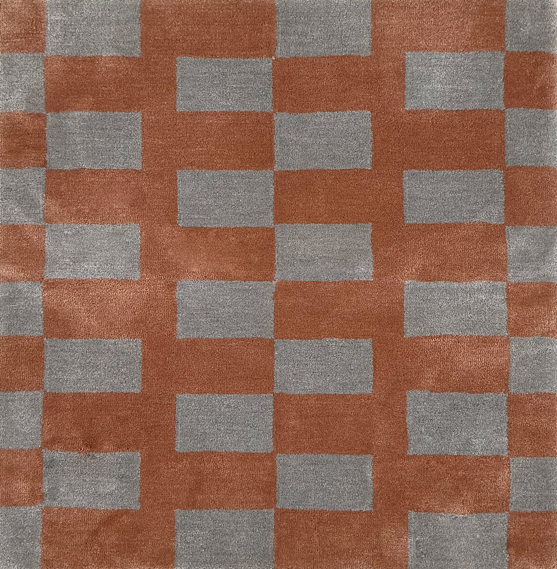 Checkered pattern with alternating coral and gray squares