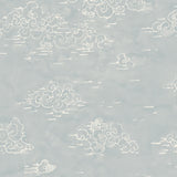 Detail of wallpaper in a painterly cloud pattern in white on a sky blue watercolor field.