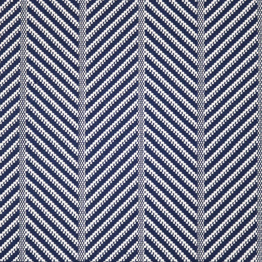 Broadloom carpet swatch in a herringbone pattern dark blue color