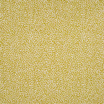 Fabric in a dappled animal print in shades of olive and mustard on a cream field.