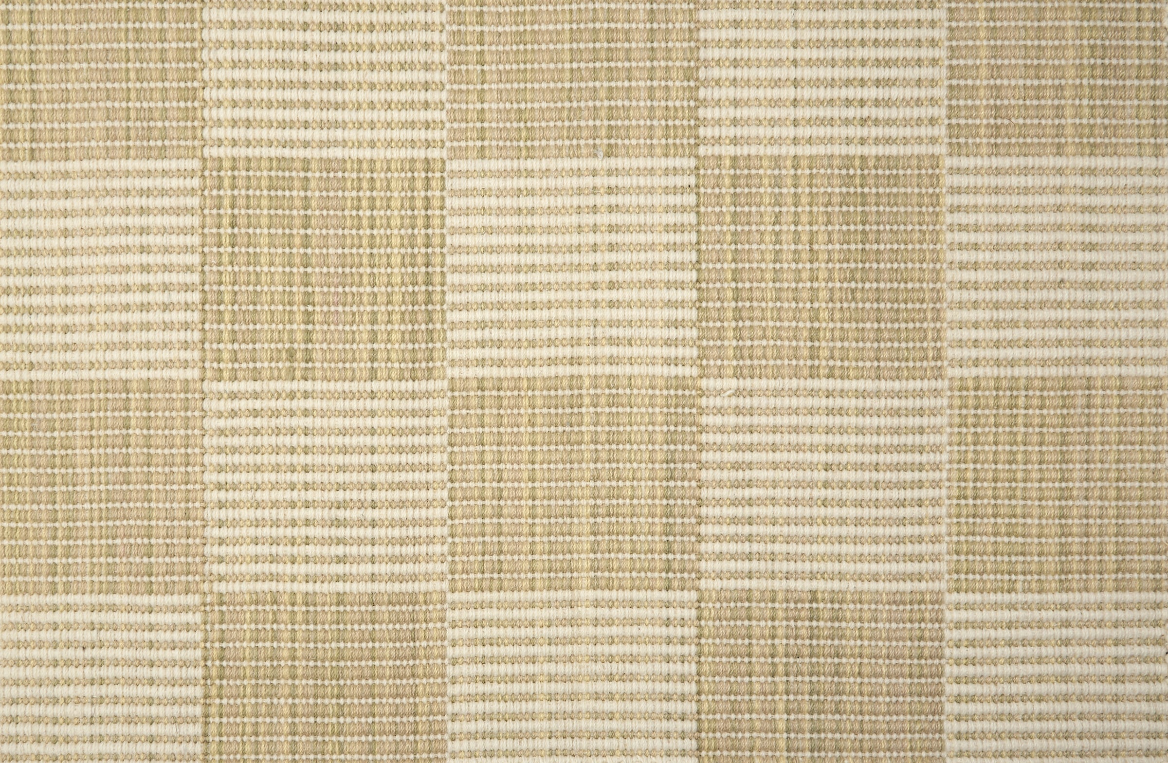 Broadloom carpet in a ribbed checkerboard pattern in cream and pastel green.