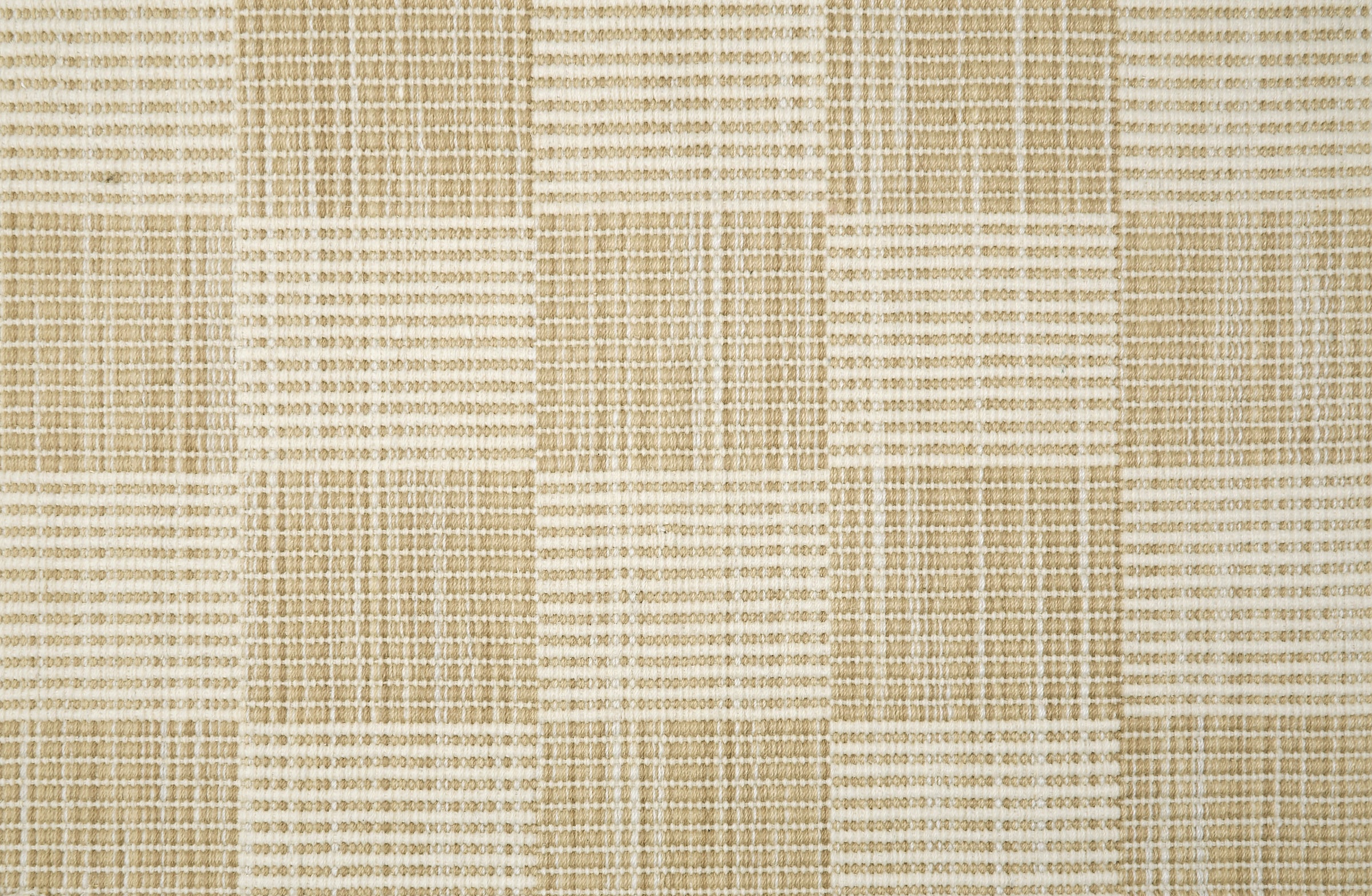 Broadloom carpet in a ribbed checkerboard pattern in cream and beige.