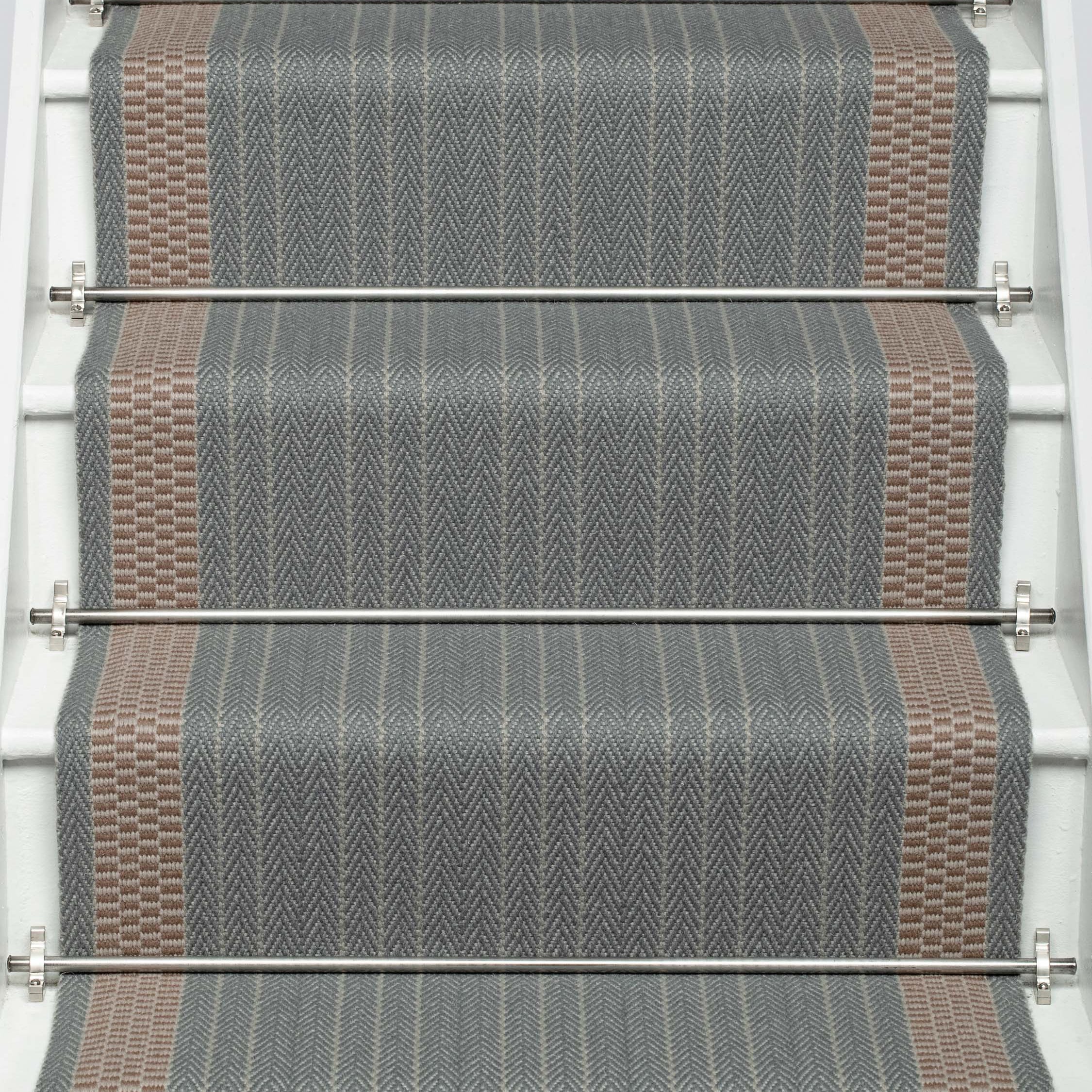 Striped flatweave runner in slate and ivory on white staircase