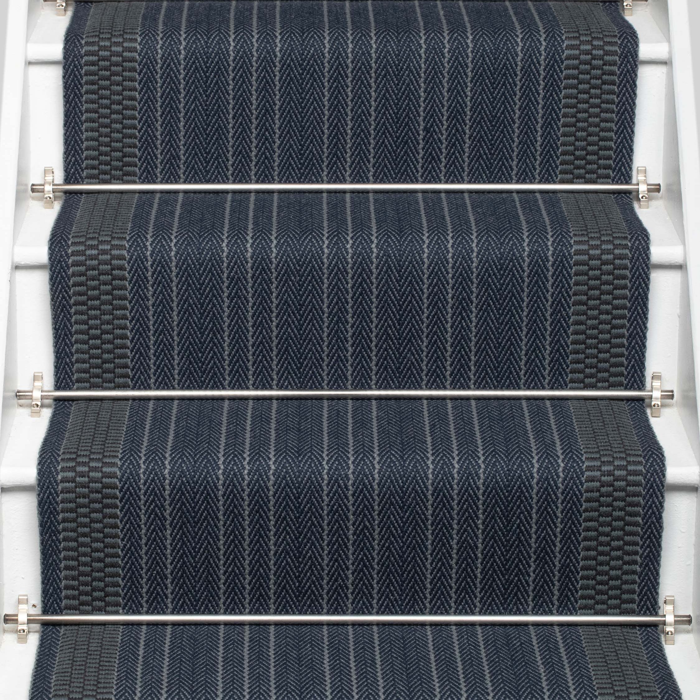 Striped flatweave runner in blue on white staircase