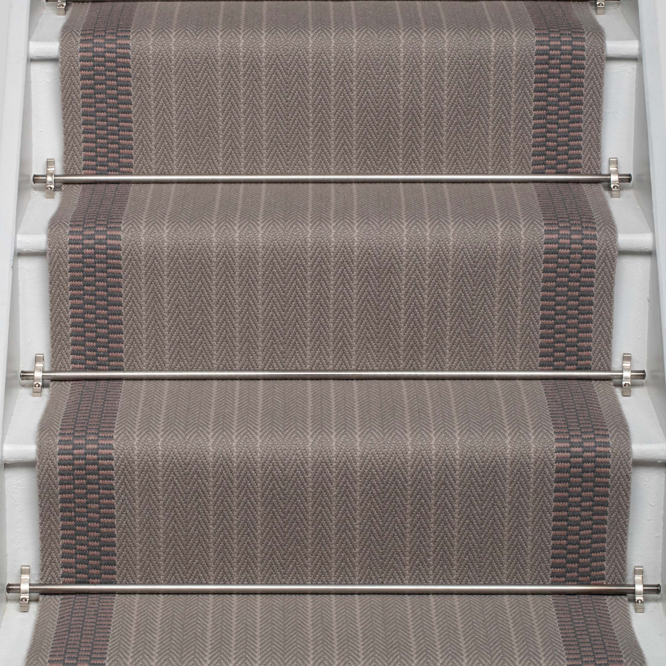 Striped flatweave runner in grey and taupe on white staircase