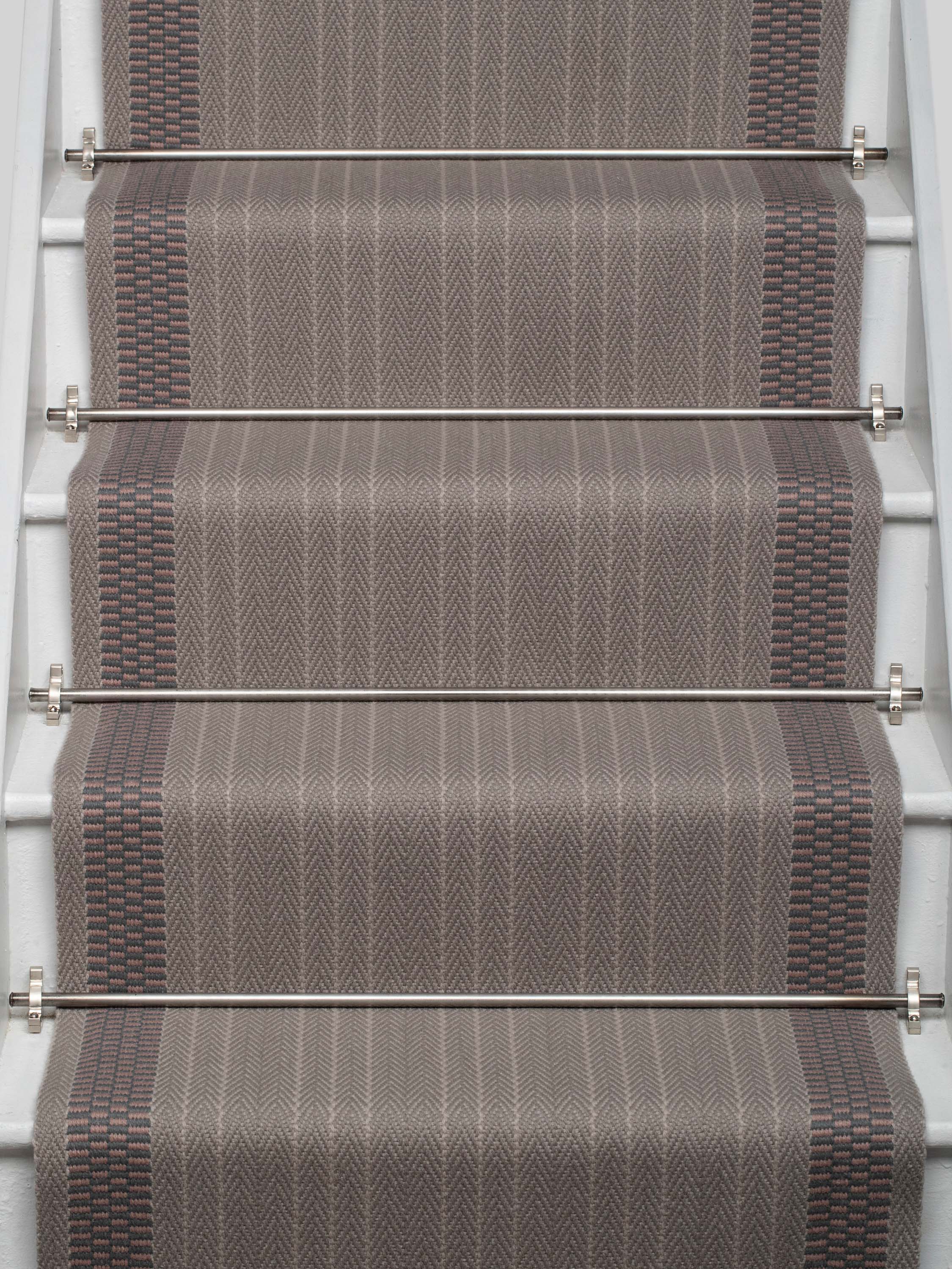 Striped flatweave runner in grey and taupe on white staircase