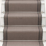 Striped flatweave runner in taupe on white staircase