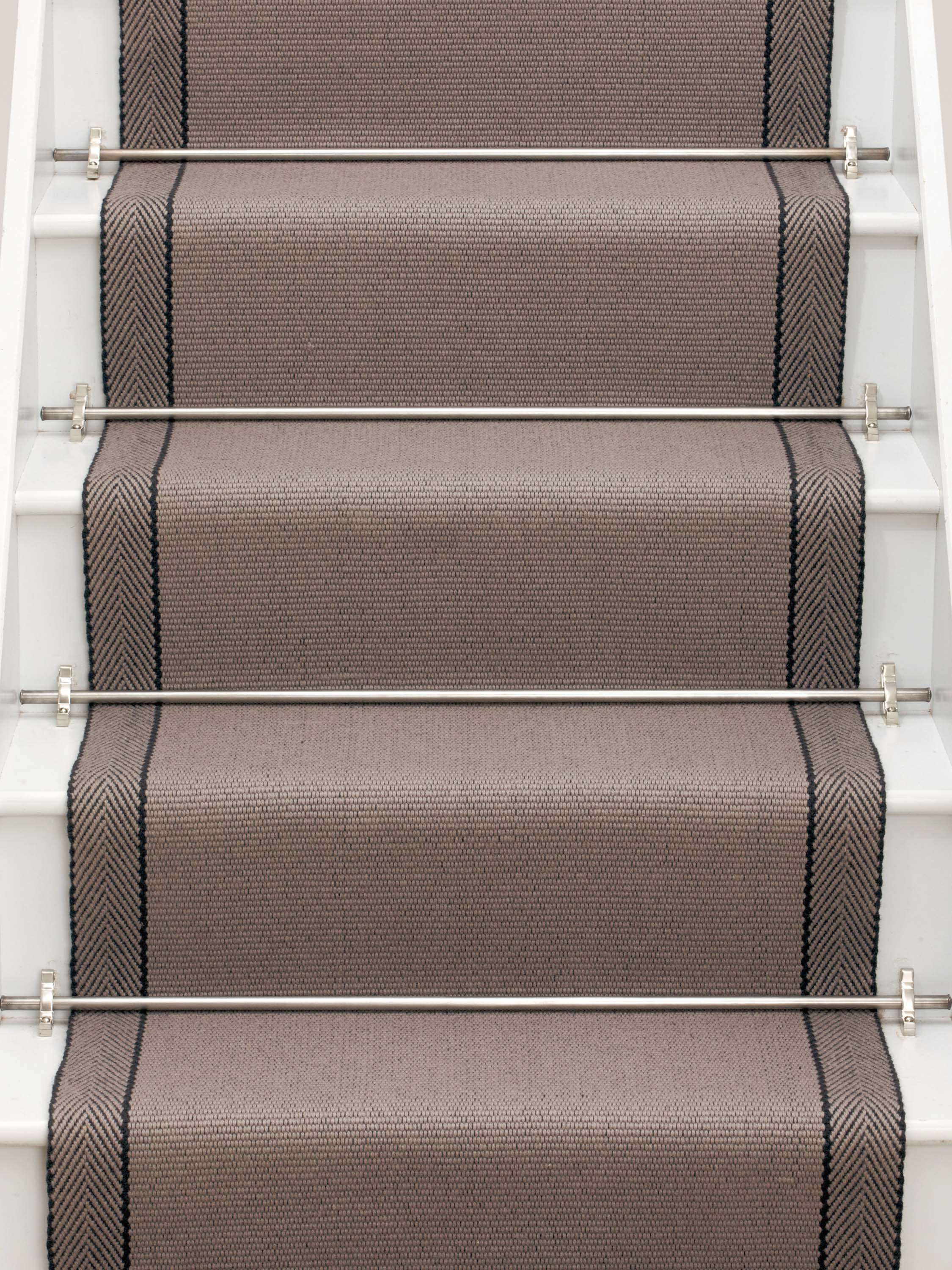 Striped flatweave runner in taupe on white staircase