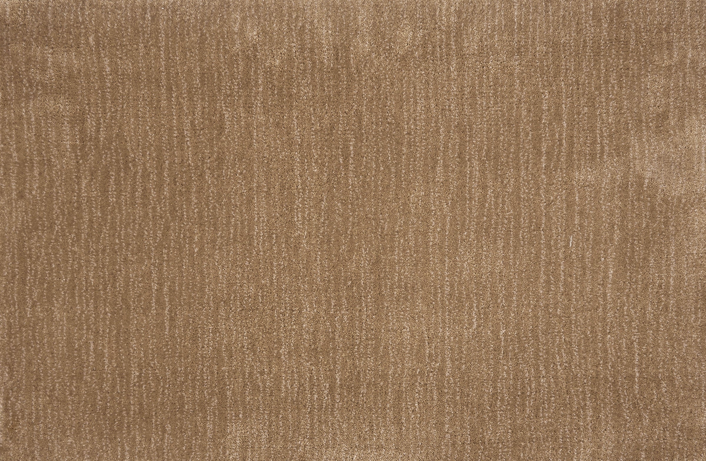 Broadloom carpet in a cut pile strié design in warm brown. 