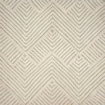 An ivory rug with a repeating raised chevron pattern on an ivory ground.