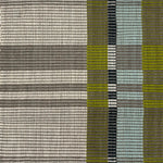 Handwoven rug in a large scale plaid in shades of olive green, blue, brown, black and cream. 