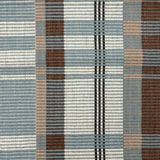 Handwoven rug in a large scale plaid in shades of teal, brown, tan, cream and black. 