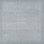 Handknotted rug sample with a tonal light blue gridded motif.