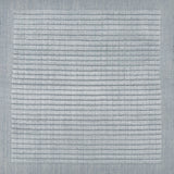 Handknotted rug sample with a tonal light blue gridded motif.