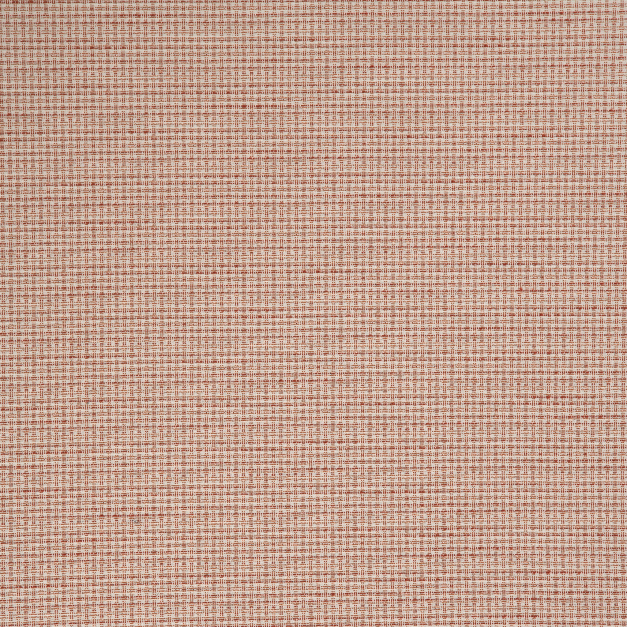 Woven outdoor fabric in a subtle check design in rust orange. 
