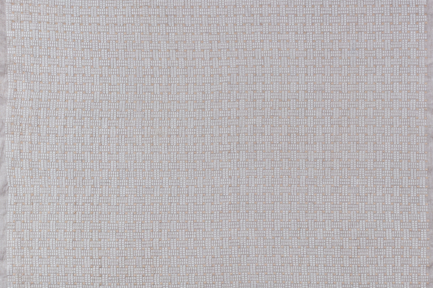 Embroidered fabric with a basketweave design in cream on a beige field. 