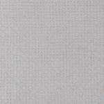 Embroidered fabric with a basketweave design in cream on a beige field. 