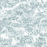 Detail of fabric in a painterly cloud print in shades of blue-gray on a cream field.