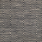 Broadloom sample in a dimensional diamond pattern in charcoal grey and ivory.