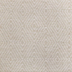 Broadloom sample in a dimensional diamond pattern in cream and ivory.