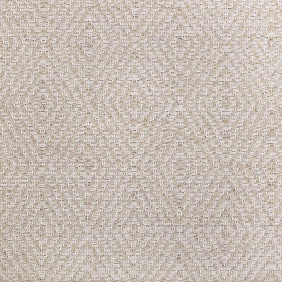 Broadloom sample in a dimensional diamond pattern in cream and ivory.