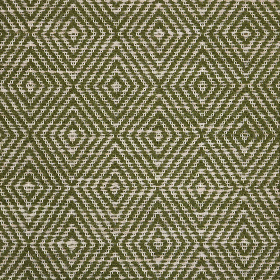 Broadloom sample in a dimensional diamond pattern in green and ivory.
