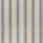 printed cotton fabric in an irregular stripe pattern in blue on a cream field.