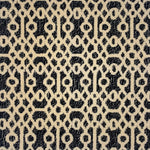 Handtufted rug with ornate filigree pattern in creme on a heathered black field. 