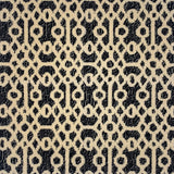 Handtufted rug with ornate filigree pattern in creme on a heathered black field. 