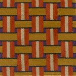 Handtufted rug with a retro geometric design in orange, yellow cream and purple. 