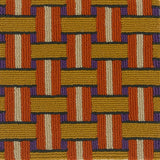 Handtufted rug with a retro geometric design in orange, yellow cream and purple. 