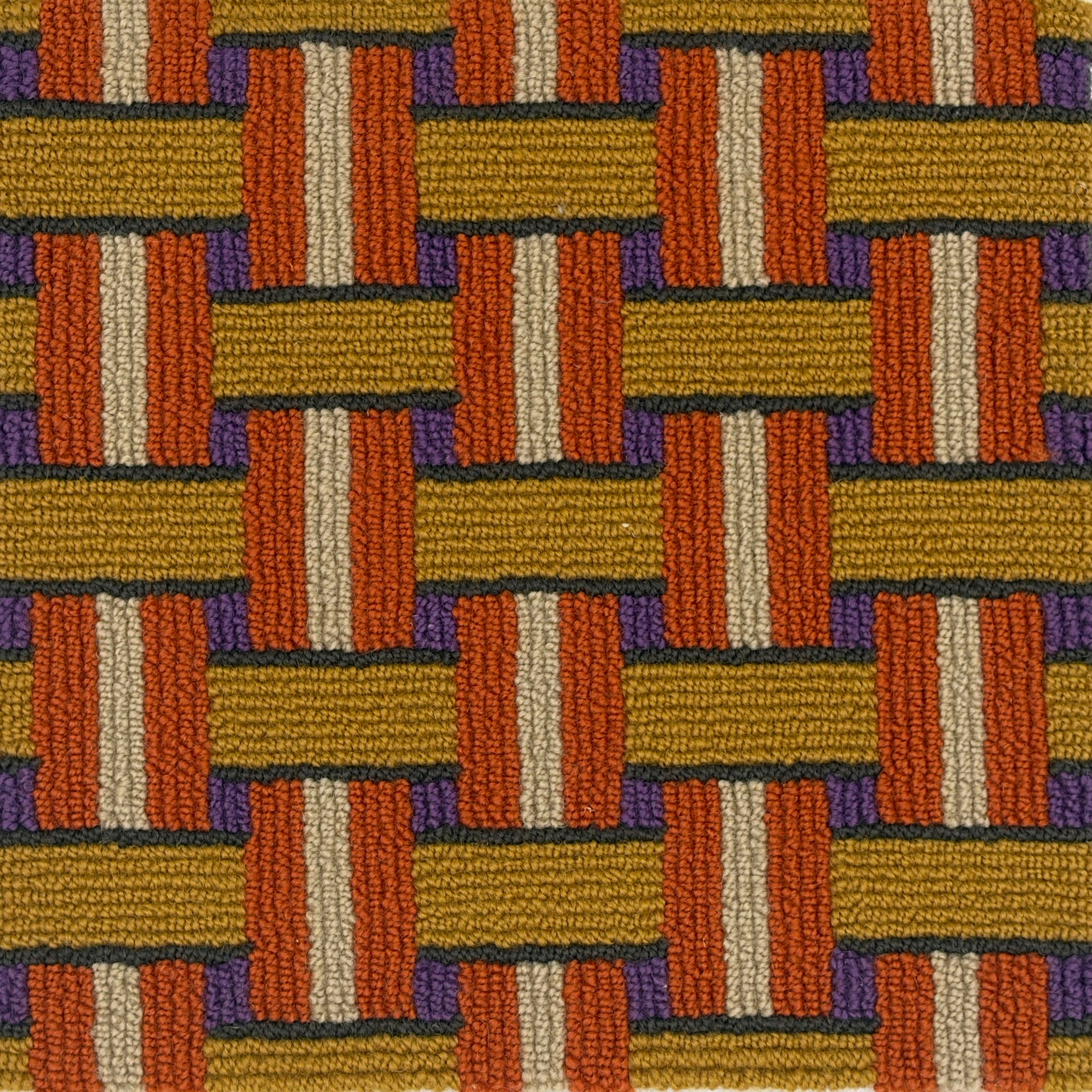 Handtufted rug with a retro geometric design in orange, yellow cream and purple. 
