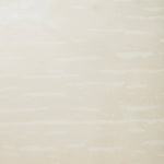 Detail of wallpaper in an abstract stripe print in shades of cream.