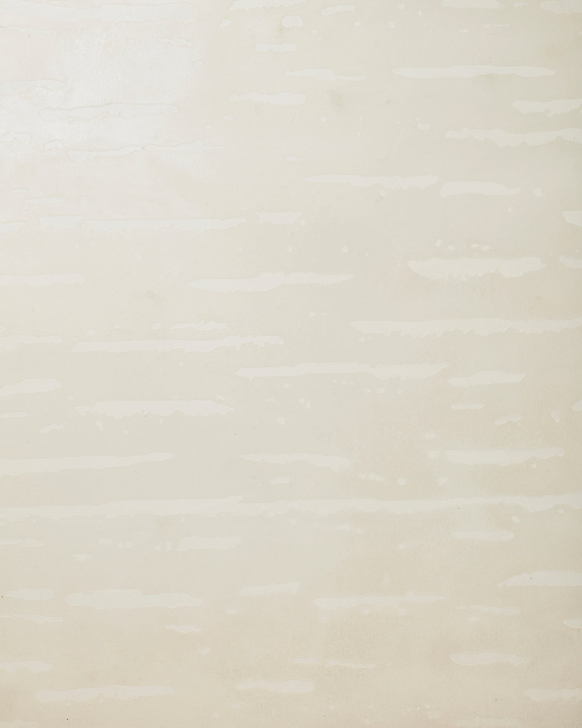 Detail of wallpaper in an abstract stripe print in shades of cream.