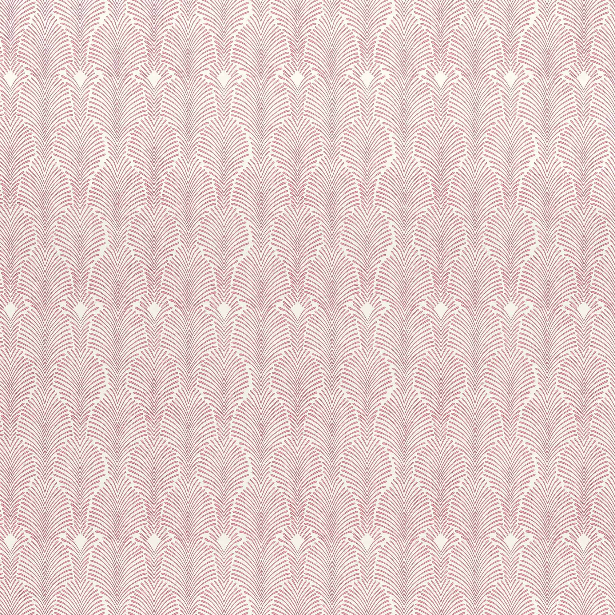 Detail of wallpaper in an art deco damask print in pink on a white field.