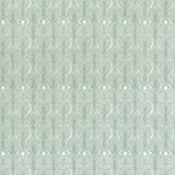 Detail of wallpaper in an art deco damask print in turquoise on a white field.