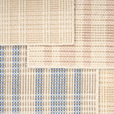 Broadloom rug samples in pastel colors in a plaid pattern