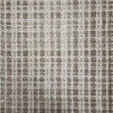 Broadloom carpet in a textural grid in taupe.