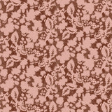 Floral patterned wallpaper in pink and brown. 