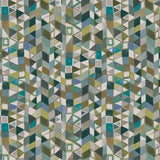 Detail of fabric in a small-scale playful geometric print in shades of blue, green, white and brown.