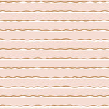 Detail of wallpaper in an undulating stripe pattern in pink, white and gold.