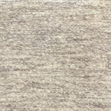 Textural bouclé broadloom carpet in soft taupe.