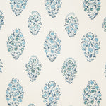 Detail of wallpaper in a floral paisley print in shades of blue and green on a cream field.