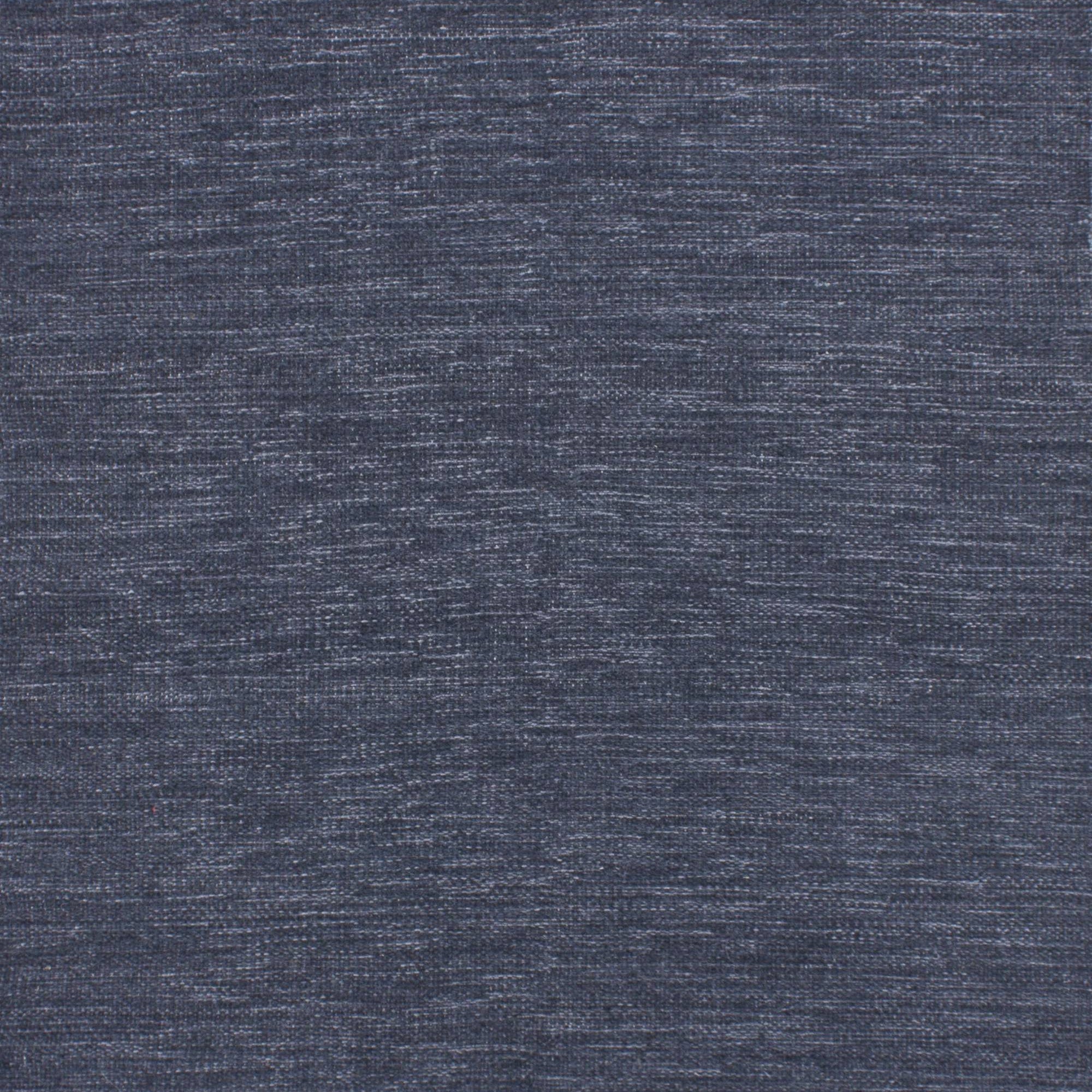 Broadloom carpet in a subtle textural solid in slate blue.