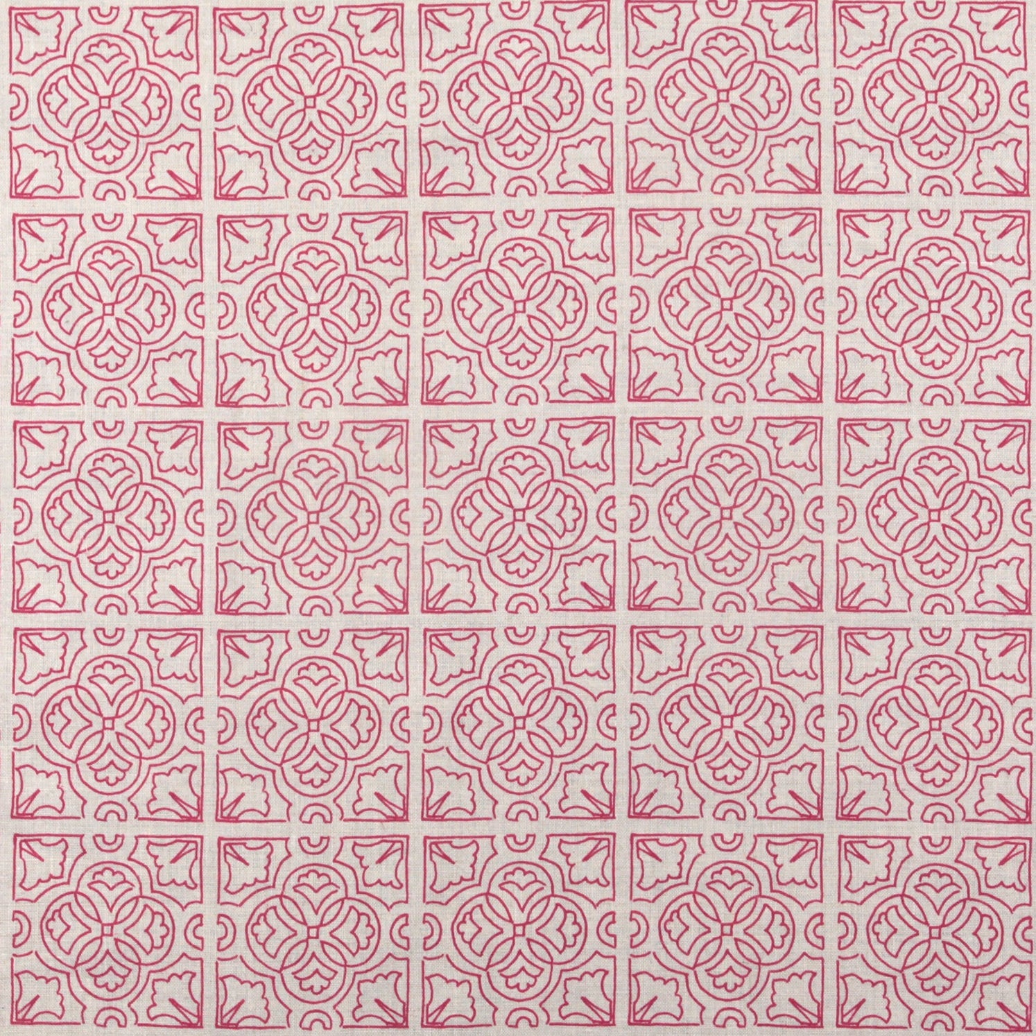 Detail of fabric in a damask lattice print in magenta on a cream field.