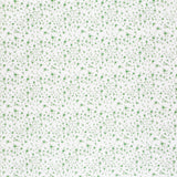 Detail of fabric in a small-scale floral pattern in green and gray on a cream field.
